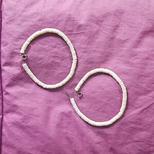White puka shell 9" ankle bracelets from Hawaii. Sold separately or as a set.